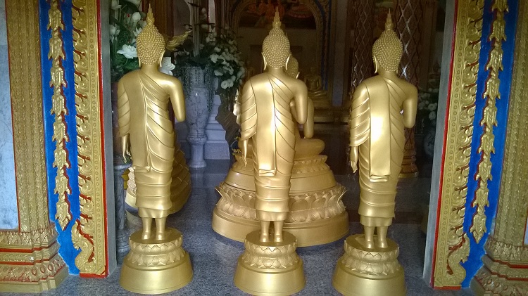 статуи будды со спины